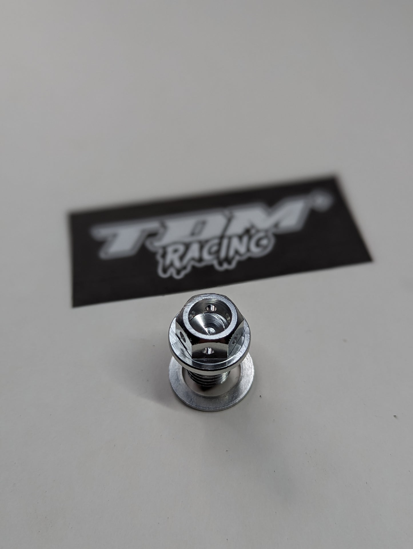 Aftermarket silver magnetic drain plug TS-TDM-MXA0818 – captures metal debris for engine protection