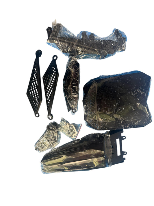 S4 plastics kit for TSK70 dirt bike with separate graphics decals, full set of uninstalled body panels.